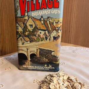 Vintage Tin- Olde Village Breakfast Oats: The Cereal Manufacturing Company